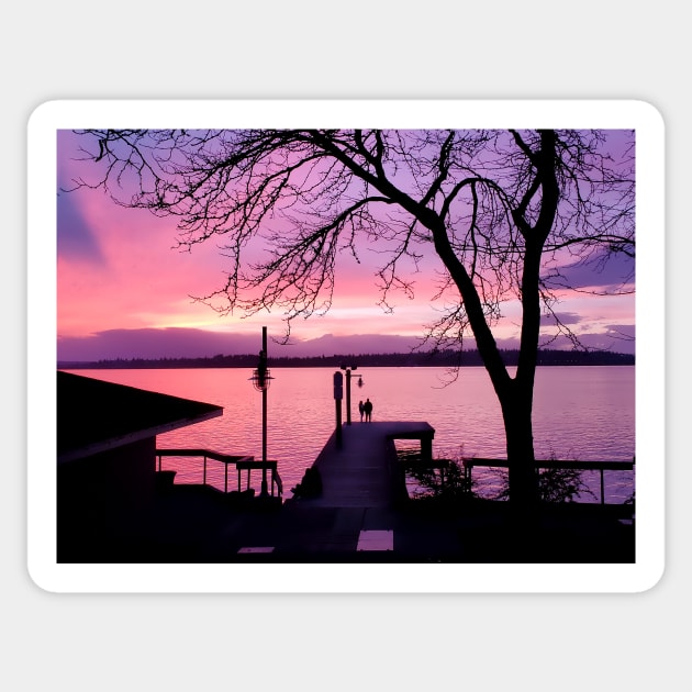 Silhouetted Couple on Dock with Pink Sunset Sky Sticker by SeaChangeDesign